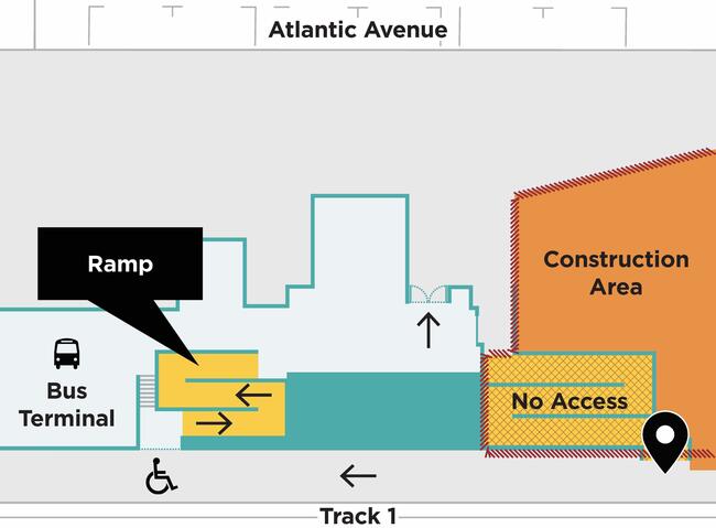 Map showing the ramp in the South Station bus terminal, providing access between Track 1 and Atlantic Ave. See text for details.