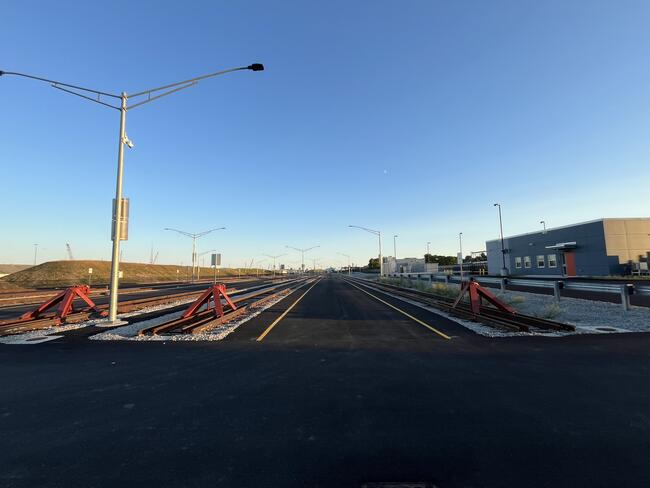 view of rail layover yard with blue sky