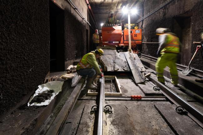 A crew places new rebar in the subway tunnel near Alewife, part of the Red Line floating slab maintenannce.