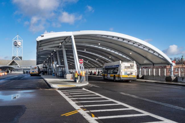 Buses enter the new upper busway canopy at Forest Hills (January 4, 2019)