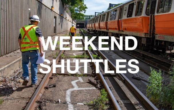 Construction crewmen on Orange Line tracks. Text: Weekend Shuttles