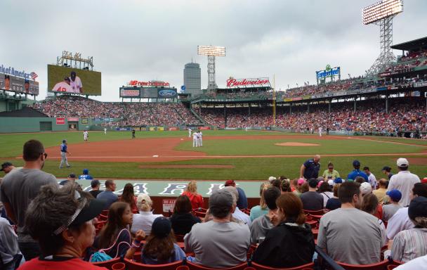 Fenway Park during a baseball game, viewing the playing field from the stands