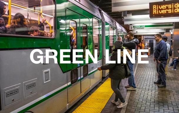 New Green Line car at Park Street, with riders on the platform getting ready to board. Text overlaid reads "Green Line."