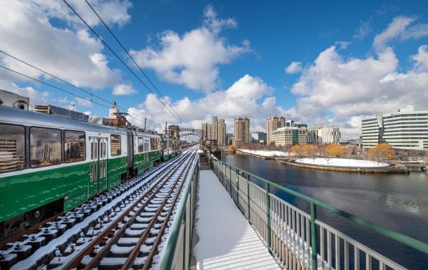 Green Line train crosses the Charles River between Science Park and Lechmere.