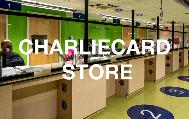 Overlaid text reads "CharlieCard Store." Interior of the store, with staff wearing masks and sitting behind plexiglass dividers.