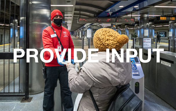 Overlaid text reads "Provide Input." A transit ambassador is talking with a rider in the background.