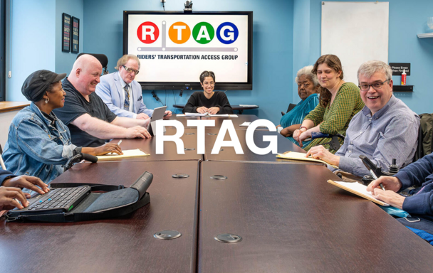 image of nine people sitting around a conference table, with a graphic behind them reading RTAG