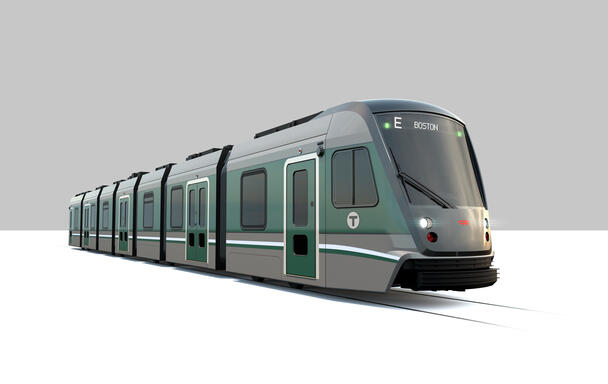 The winning design is “Option 3,” featuring a green and dark gray paint scheme along the body of the vehicle, green doors, and a white and navy blue lower running strip.