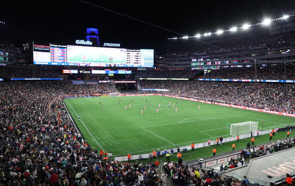 A soccer match at night at Gillette Stadium