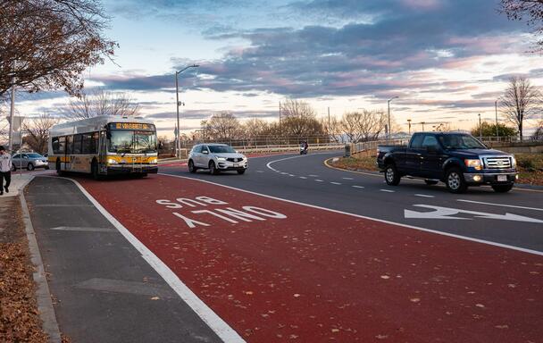 A Route 112 bus drives into Sweetser Circle
