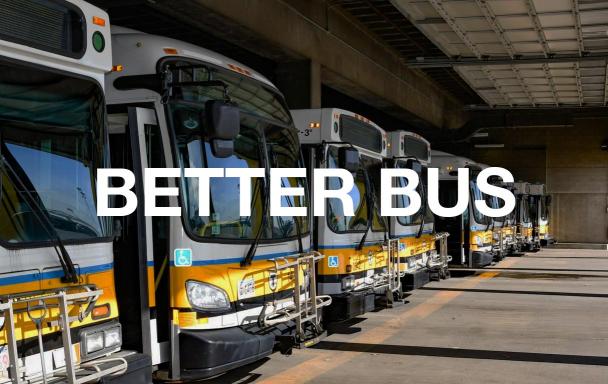 Buses parking in a garage. Text overlaid: Better Bus