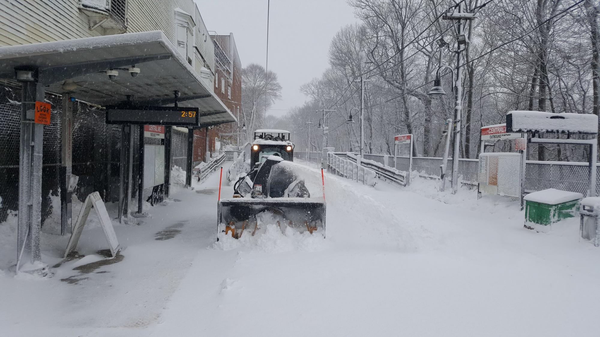 Snow removal plow clears the lines at the Central Ave Station on the Mattapan Line